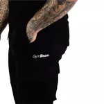 GymBeam TRN melegitőnadrág - fekete