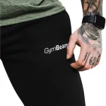 GymBeam Slimfit férfi melegitőnadrág - fekete